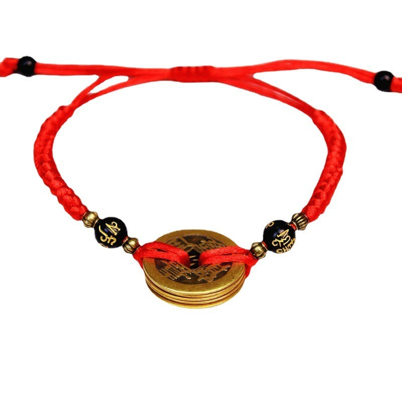 Bracelet pour attirer l'abondance en corde rouge tissé à la main avec des pièces de cuivre