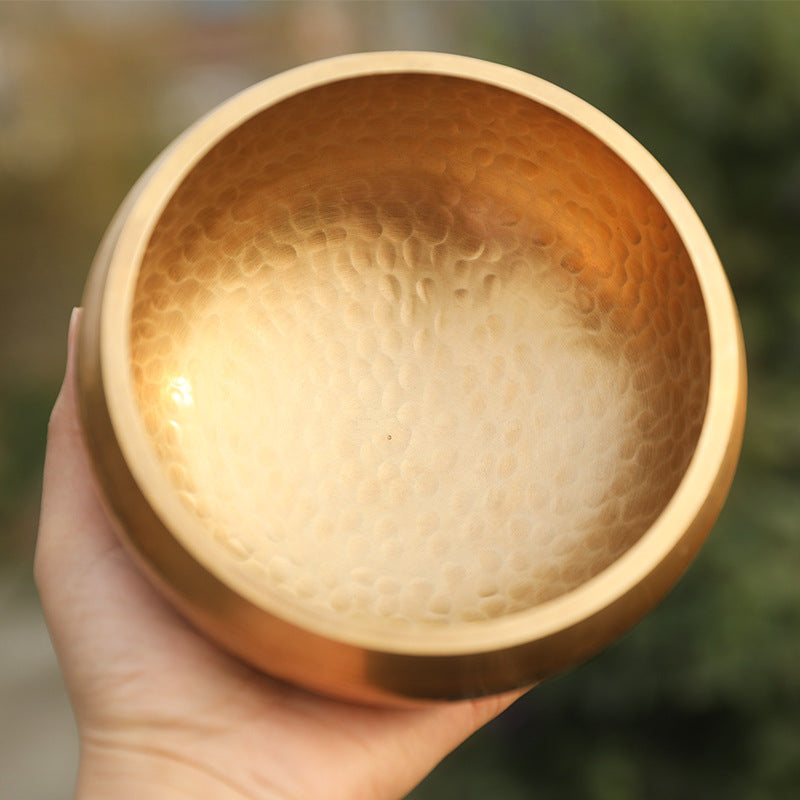 Tibetan singing bowl, bronze chime and its mallet