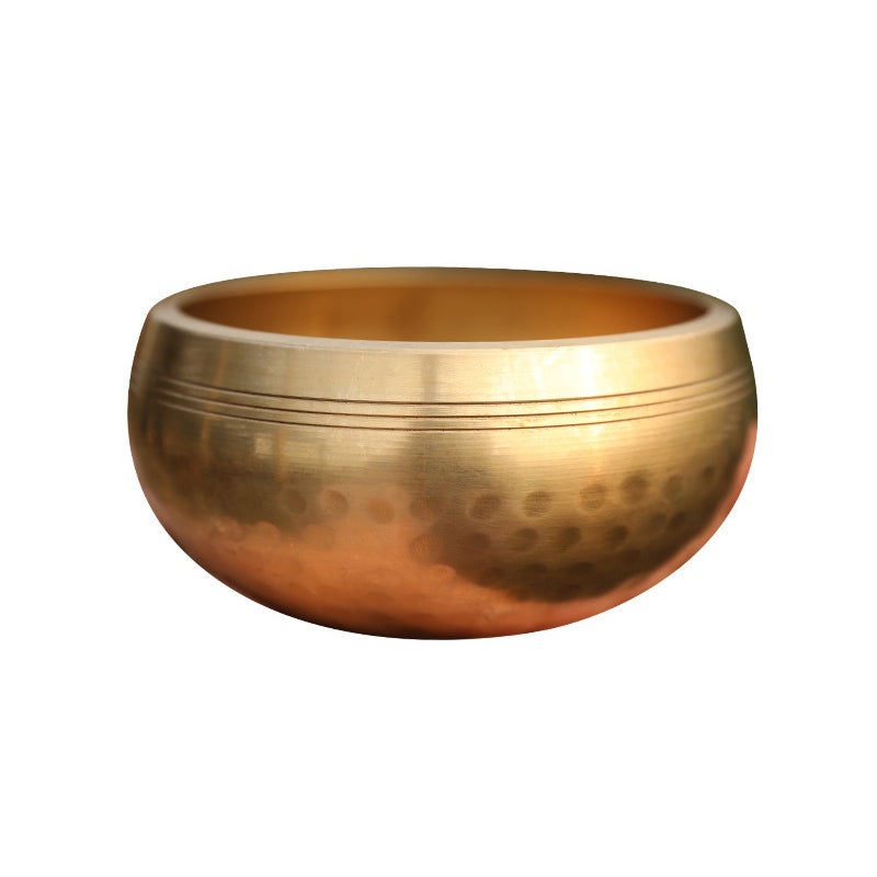 Tibetan singing bowl, bronze chime and its mallet