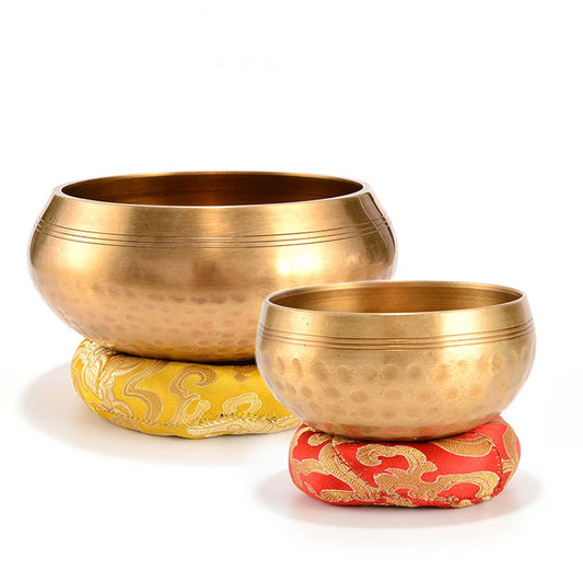 Tibetan singing bowl, bronze chime and its mallet